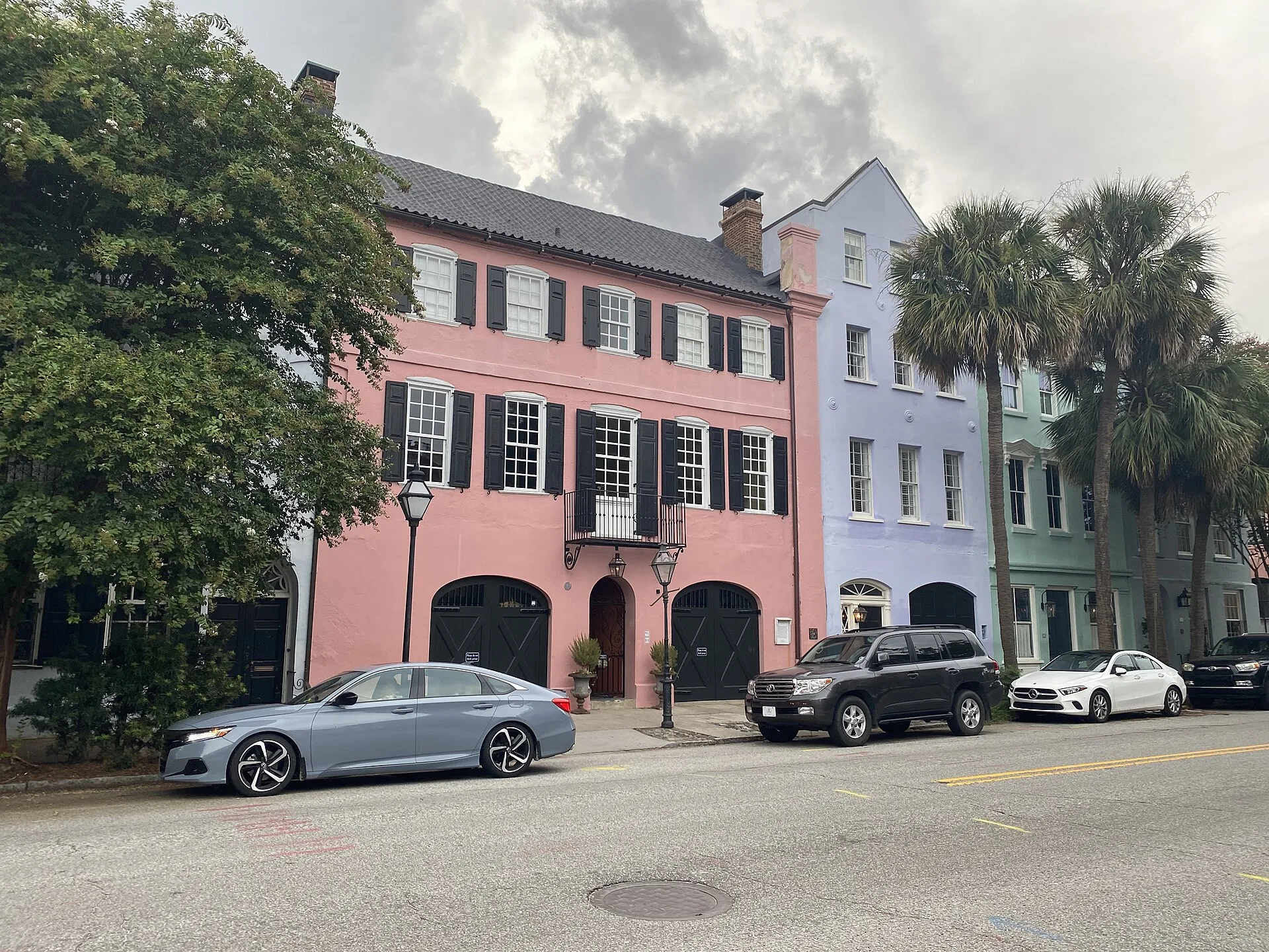 Historic pastel row houses along East Bay Street in Charleston, South Carolina